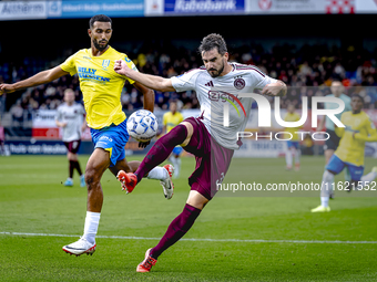 RKC player Yassin Oukili and AFC Ajax Amsterdam defender Josip Sutalo during the match RKC vs. Ajax at the Mandemakers Stadium for the Dutch...