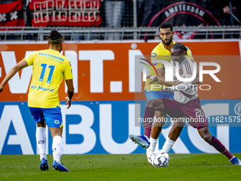 RKC player Yassin Oukili and AFC Ajax Amsterdam forward Bertrand Traore during the match RKC vs. Ajax at the Mandemakers Stadium for the Dut...