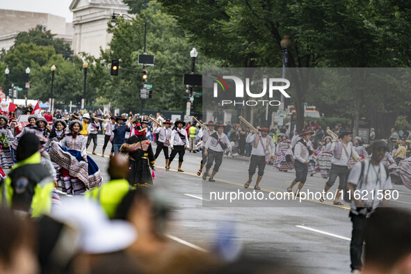 A parade takes place in Washington, DC, USA, on September 29, 2024, for Hispanic Heritage Month. 