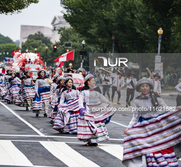 A parade takes place in Washington, DC, USA, on September 29, 2024, for Hispanic Heritage Month. 