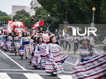 A parade takes place in Washington, DC, USA, on September 29, 2024, for Hispanic Heritage Month. (