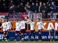 Players of Ajax celebrate the goal during the match RKC - Ajax at the Mandemakers Stadium for the Dutch Eredivisie season 2024-2025 in Waalw...