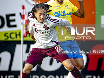 AFC Ajax Amsterdam midfielder Kian Fitz-Jim and RKC player Alexander Jakobsen during the match RKC - Ajax at the Mandemakers Stadium for the...