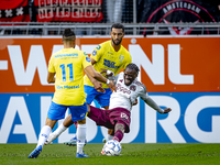 RKC player Yassin Oukili and AFC Ajax Amsterdam forward Bertrand Traore during the match RKC vs. Ajax at the Mandemakers Stadium for the Dut...