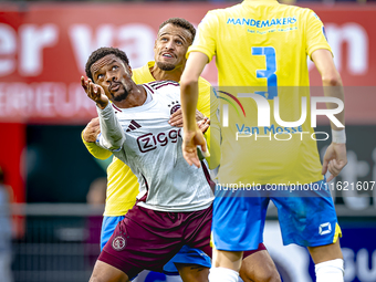 AFC Ajax Amsterdam defender Devyne Rensch and RKC player Alexander Jakobsen during the match RKC - Ajax at the Mandemakers Stadium for the D...