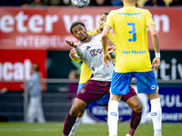 AFC Ajax Amsterdam defender Devyne Rensch and RKC player Alexander Jakobsen during the match RKC - Ajax at the Mandemakers Stadium for the D...