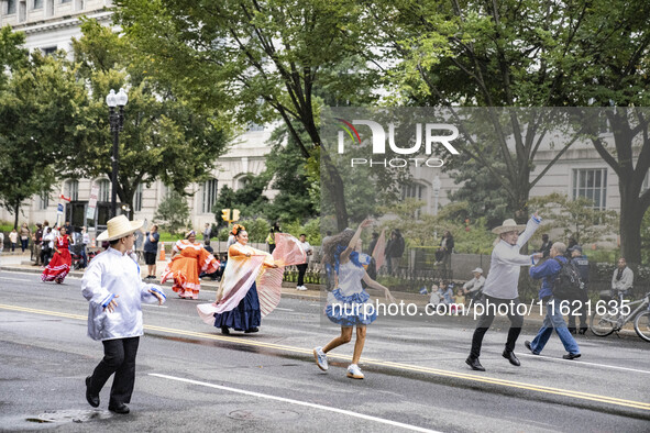 A parade takes place in Washington, DC, USA, on September 29, 2024, for Hispanic Heritage Month. 