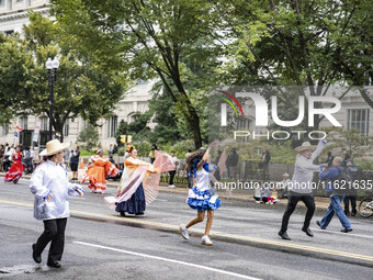 A parade takes place in Washington, DC, USA, on September 29, 2024, for Hispanic Heritage Month. (