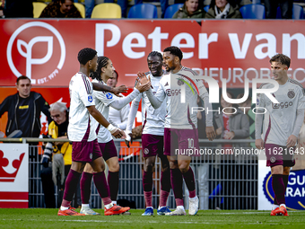 Players of Ajax celebrate the goal. AFC Ajax Amsterdam forward Mika Godts and AFC Ajax Amsterdam forward Chuba Akpom during the match RKC -...