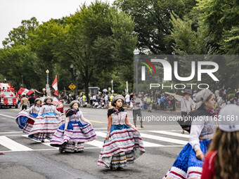 A parade takes place in Washington, DC, USA, on September 29, 2024, for Hispanic Heritage Month. (