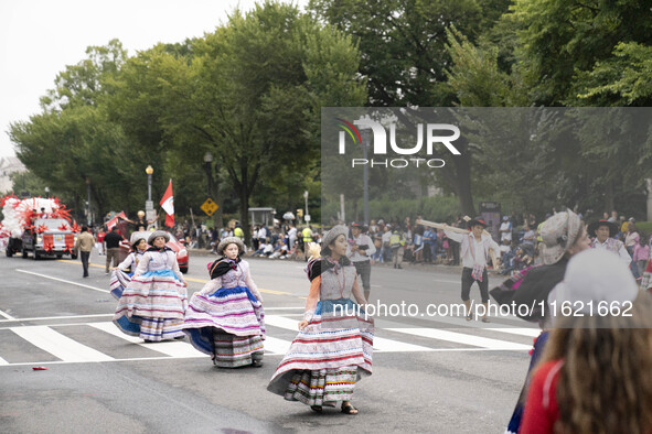 A parade takes place in Washington, DC, USA, on September 29, 2024, for Hispanic Heritage Month. 