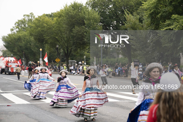 A parade takes place in Washington, DC, USA, on September 29, 2024, for Hispanic Heritage Month. 