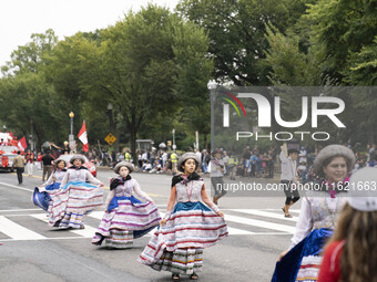 A parade takes place in Washington, DC, USA, on September 29, 2024, for Hispanic Heritage Month. (