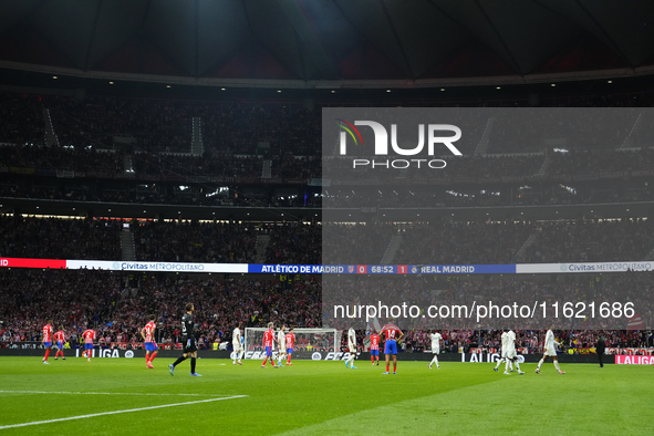 The players retire because of the temporary suspension of the match due to the throwing of objects.during the LaLiga match between Atletico...