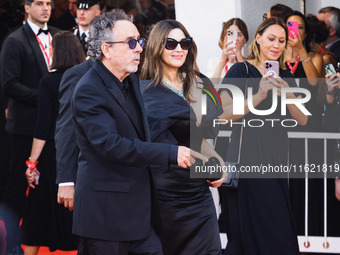 Tim Burton and Monica Bellucci attend the red carpet for the premiere of Beetlejuice Beetlejuice during the 81st Venice International Film F...