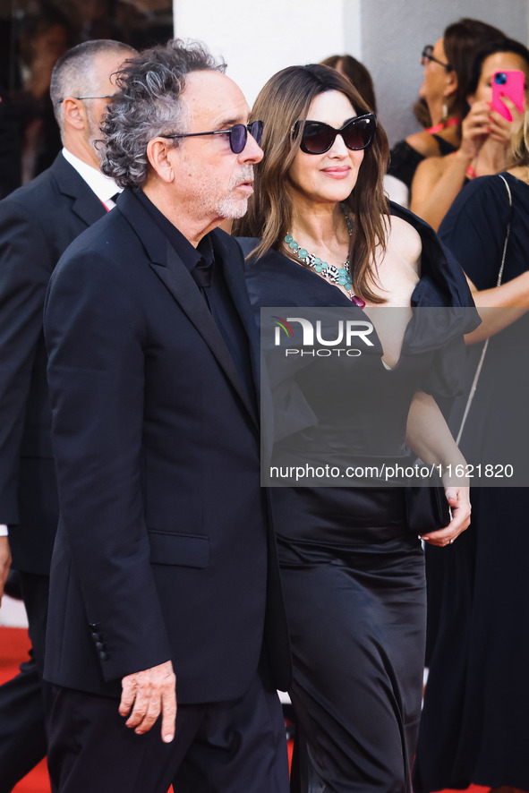 Tim Burton and Monica Bellucci attend the red carpet for the premiere of Beetlejuice Beetlejuice during the 81st Venice International Film F...