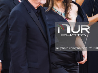 Tim Burton and Monica Bellucci attend the red carpet for the premiere of Beetlejuice Beetlejuice during the 81st Venice International Film F...