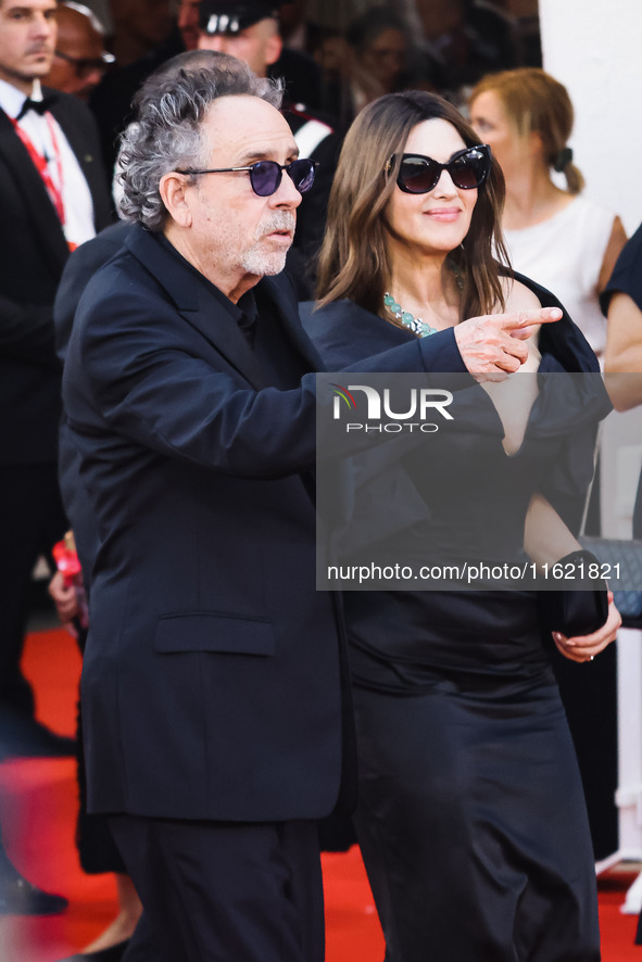 Tim Burton and Monica Bellucci attend the red carpet for the premiere of Beetlejuice Beetlejuice during the 81st Venice International Film F...