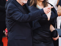 Tim Burton and Monica Bellucci attend the red carpet for the premiere of Beetlejuice Beetlejuice during the 81st Venice International Film F...