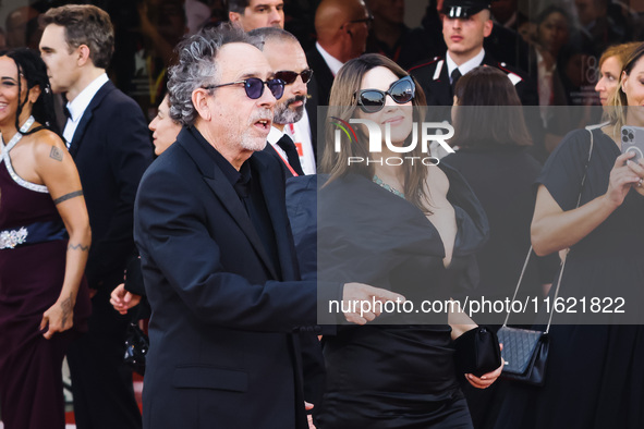 Tim Burton and Monica Bellucci attend the red carpet for the premiere of Beetlejuice Beetlejuice during the 81st Venice International Film F...