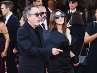 Tim Burton and Monica Bellucci attend the red carpet for the premiere of Beetlejuice Beetlejuice during the 81st Venice International Film F...