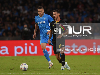 Pedro Pereira of AC Monza competes for the ball with Alessandro Buongiorno of SSC Napoli during the Serie A match between SSC Napoli and AC...