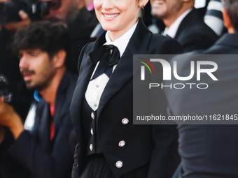 Winona Ryder attends the red carpet for the premiere of Beetlejuice Beetlejuice during the 81st Venice International Film Festival at Palazz...