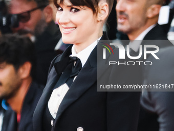 Winona Ryder attends the red carpet for the premiere of Beetlejuice Beetlejuice during the 81st Venice International Film Festival at Palazz...