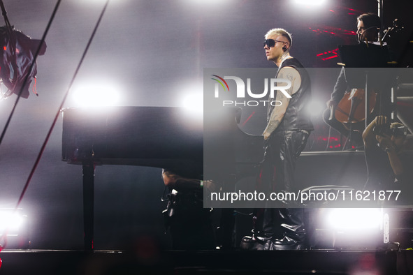 Lazza performs live during the Locura Opera N. 1 Tour at Piazzale Angelo Moratti in front of San Siro Stadium in Milan, Italy, on September...