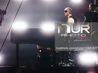 Lazza performs live during the Locura Opera N. 1 Tour at Piazzale Angelo Moratti in front of San Siro Stadium in Milan, Italy, on September...