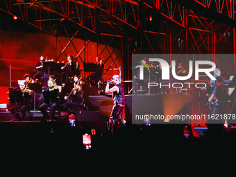 Lazza performs live during the Locura Opera N. 1 Tour at Piazzale Angelo Moratti in front of San Siro Stadium in Milan, Italy, on September...