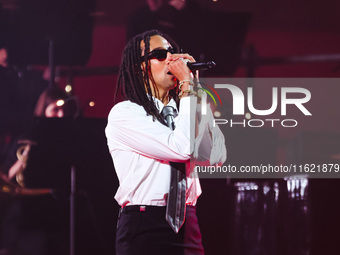 Ghali performs live during the Locura Opera N. 1 Tour at Piazzale Angelo Moratti in front of San Siro Stadium in Milan, Italy, on September...