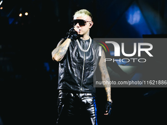 Lazza performs live during the Locura Opera N. 1 Tour at Piazzale Angelo Moratti in front of San Siro Stadium in Milan, Italy, on September...