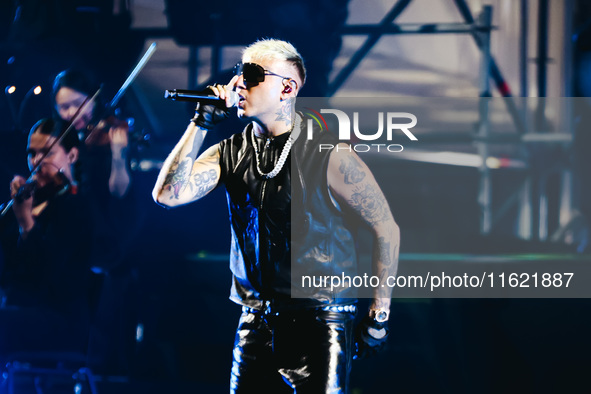 Lazza performs live during the Locura Opera N. 1 Tour at Piazzale Angelo Moratti in front of San Siro Stadium in Milan, Italy, on September...