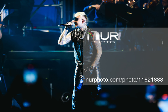 Lazza performs live during the Locura Opera N. 1 Tour at Piazzale Angelo Moratti in front of San Siro Stadium in Milan, Italy, on September...