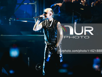 Lazza performs live during the Locura Opera N. 1 Tour at Piazzale Angelo Moratti in front of San Siro Stadium in Milan, Italy, on September...