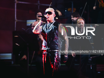 Lazza performs live during the Locura Opera N. 1 Tour at Piazzale Angelo Moratti in front of San Siro Stadium in Milan, Italy, on September...