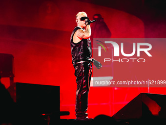 Lazza performs live during the Locura Opera N. 1 Tour at Piazzale Angelo Moratti in front of San Siro Stadium in Milan, Italy, on September...