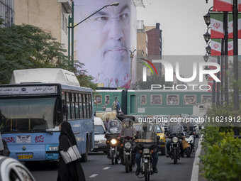 A giant banner featuring a portrait of Lebanon's Hezbollah Secretary General, Hassan Nasrallah, who was killed in an Israeli air strike in a...