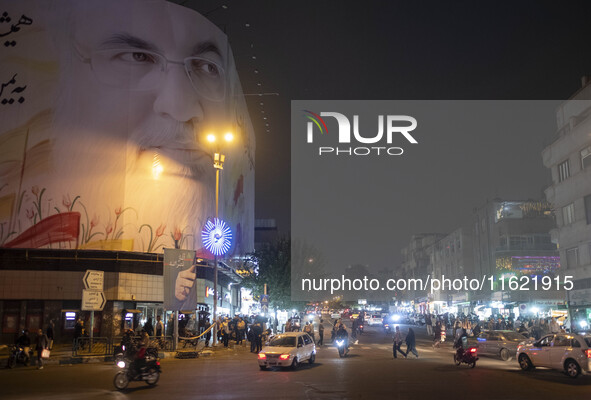 A giant banner featuring a portrait of Lebanon's Hezbollah Secretary General, Hassan Nasrallah, who was killed in an Israeli air strike in a...