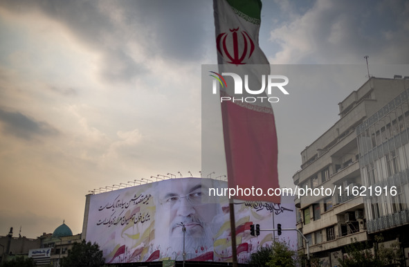 A giant banner featuring a portrait of Lebanon's Hezbollah Secretary General, Hassan Nasrallah, who was killed in an Israeli air strike in a...