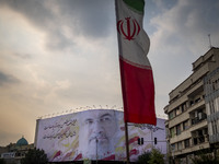 A giant banner featuring a portrait of Lebanon's Hezbollah Secretary General, Hassan Nasrallah, who was killed in an Israeli air strike in a...