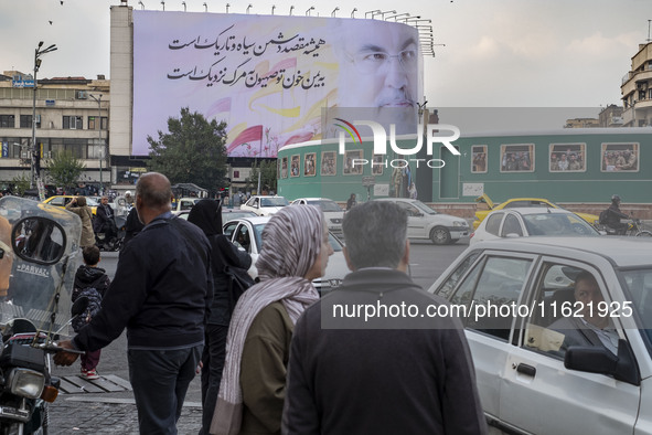 A giant banner featuring a portrait of Lebanon's Hezbollah Secretary General, Hassan Nasrallah, who was killed in an Israeli air strike in a...