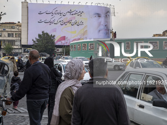 A giant banner featuring a portrait of Lebanon's Hezbollah Secretary General, Hassan Nasrallah, who was killed in an Israeli air strike in a...