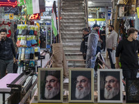 A framed portrait of Lebanon's Hezbollah Secretary General, Hassan Nasrallah, who was killed in an Israeli air strike in a suburb of Beirut,...