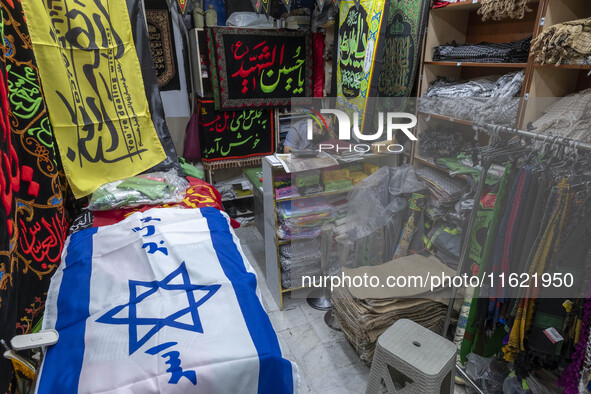 An Israeli flag is pictured at a shop at a war toys and religious accessory shopping mall in downtown Tehran, Iran, on September 29, 2024. L...