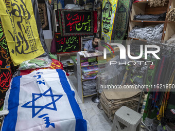 An Israeli flag is pictured at a shop at a war toys and religious accessory shopping mall in downtown Tehran, Iran, on September 29, 2024. L...