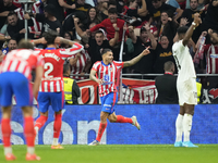 Angel Correa right winger of Atletico de Madrid and Argentina celebrates after scoring his sides first goal during the LaLiga match between...