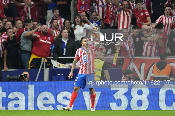 Angel Correa right winger of Atletico de Madrid and Argentina celebrates after scoring his sides first goal during the LaLiga match between...