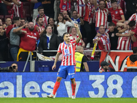 Angel Correa right winger of Atletico de Madrid and Argentina celebrates after scoring his sides first goal during the LaLiga match between...